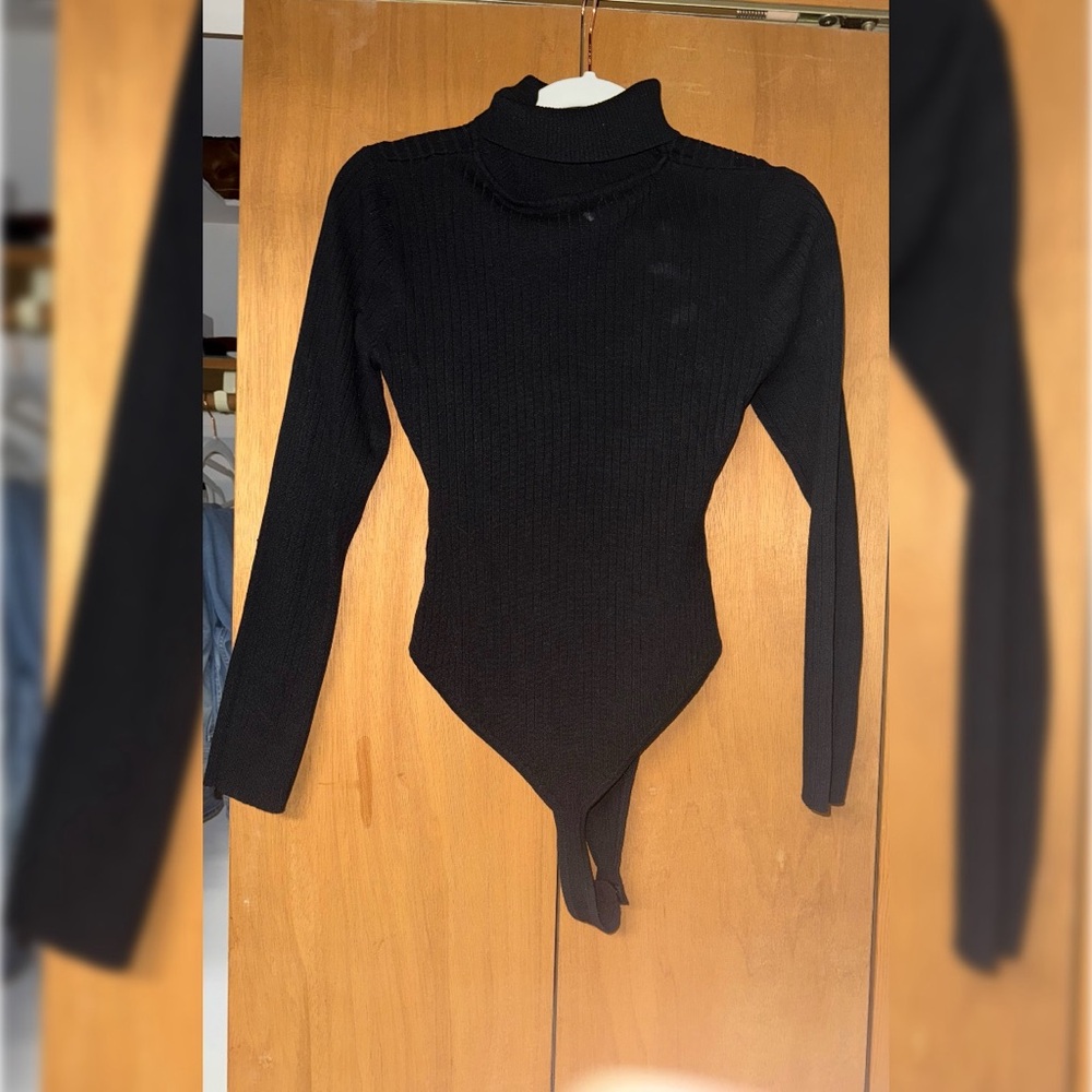 High leg, turtle neck, body suit.